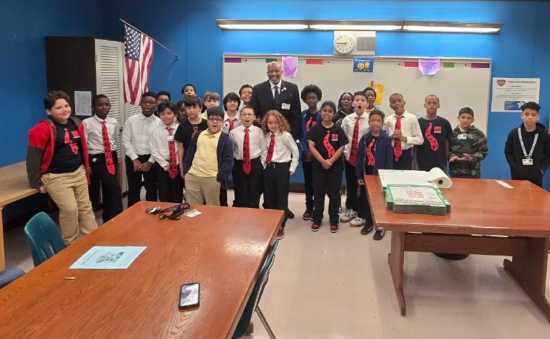 Dr. Bernard W. H. Jennings mentoring students in the classroom